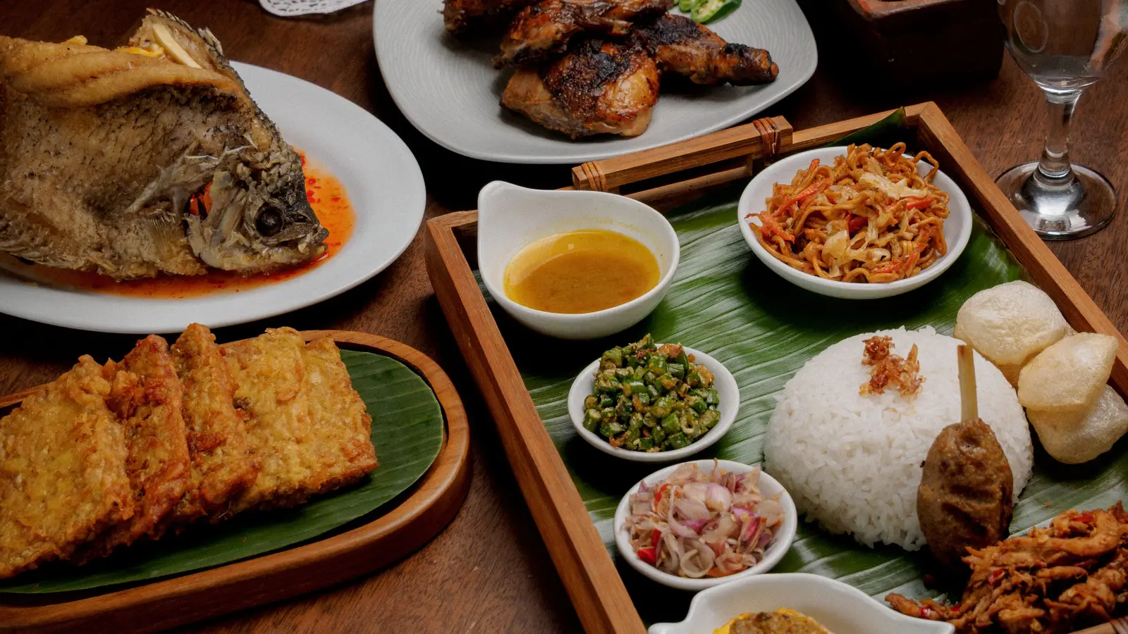Indonesian dishes served on a wooden table